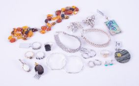 A mixed lot of silver jewellery to include four silver bracelets, total weight 77.31gm, four pairs
