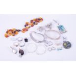 A mixed lot of silver jewellery to include four silver bracelets, total weight 77.31gm, four pairs