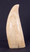 A 19th century whale tooth with scrimshaw decoration carved with a ship and a portrait of a women,