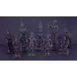 Eight bronze deity figures, tallest 20cm.