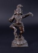 A bronze deity figure, height 17cm.