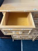 A Florida faux bamboo chest of drawers and a pair of matching bedside cabinets (3).