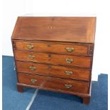 A Georgian mahogany writing bureau fitted with four drawers and brass handles, height 105cm, width