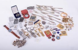 A mixed lot containing some silver plated cutlery, penknife, lighters, watches including Swatch,