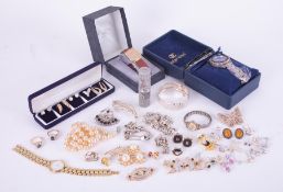 A mixed lot to include costume jewellery, silver & watches to include silver curb chain, silver curb