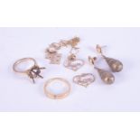 A mixed lot of 9ct yellow gold jewellery items to include earrings, rings, chain, pendants, etc,