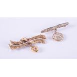Two bar style brooches to include a 14k yellow gold bar brooch with leaf engraved pattern and a