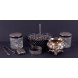 A small collection of silver items to comprise sugar tongs, pair of silver top jars, silver bangle