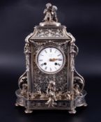 A Charles Frodsham silver plated clock decorated with cherubs, inscribed to front face 'Cha Frodsham