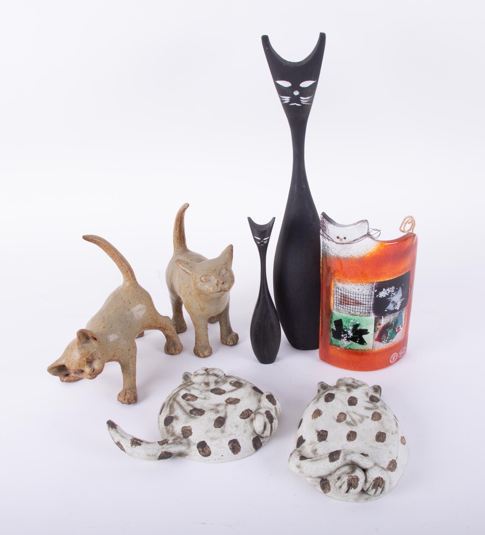 Two Gil Tregunna studio pottery cats (one is signed) together with a signed Anactacia glass in