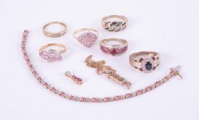 A mixed lot of 9ct yellow gold jewellery to include six rings set with diamonds, emerald,