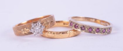 A 22ct yellow gold ring engraved with hearts & flowers, 3.70gm, size N-N 1/2 (hard to size as bent