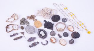 A mixed lot of jewellery to include cameos, mourning jewellery, silver jewellery items, beads,