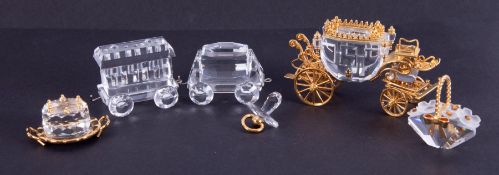 Swarovski Crystal Glass comprising of passenger carriage, wagon, pacifier, flower basket, birthday
