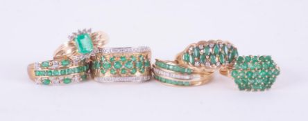 A mixed bag of six 9ct yellow gold rings set with emeralds & diamonds, total weight 23.73gm