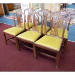 A set of six mahogany Hepplewhite style dining chairs.
