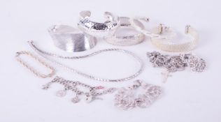 A selection of silver jewellery to include bangles, bracelets, chains, etc. total weight approx.