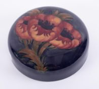 A William Moorcroft large 'Poppy' ginger jar lid, diameter 22cm.