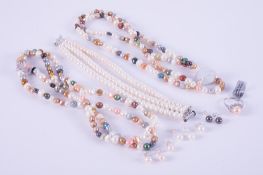 A mixed selection of pearl jewellery to include two long strands of multi-coloured pearl