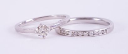 A platinum ring set with a round brilliant cut diamond, approx. 0.35 carats, approx. colour J-K &