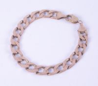 A 9ct yellow gold curb link bracelet, length 23cm, 31gm.