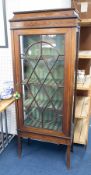 An Edwardian mahogany inlaid single door display cabinet, height 170cm.