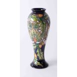 Moorcroft, a Philip Gibson vase decorated with acorns, number 10/150 2003, height 29cm.