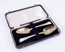 Pair Geo. III silver and gilt berry spoons, London hallmark, circa 1812, maker mark AB GB (