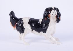 A Beswick King Charles spaniel dog, length 17cm.