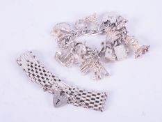A silver gate bracelet with heart padlock, 20.29gm and a silver charm bracelet with heart padlock