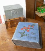 An album of traditional postcards including photographic, together with a pewter embossed box and