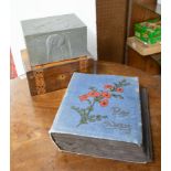 An album of traditional postcards including photographic, together with a pewter embossed box and