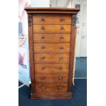 A Victorian mahogany Wellington chest fitted with eight drawers, height 128cm, width 66cm.