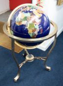 Large Gemstone floor standing globe, on gilt metal stand with compass stretcher, height 105cm.