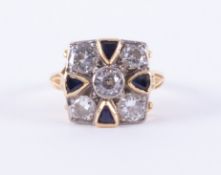 An impressive 18ct yellow & white gold 'Art Deco' geometric designed ring set with five round