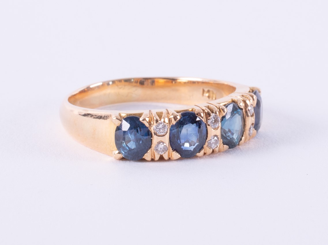 An 18ct yellow gold ring set with four oval cut sapphires, approx. total sapphire weight 1.40 - Image 2 of 3