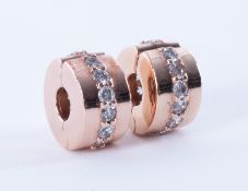 Pandora, two sparkling spacer charms, 14k rose gold-platedwith a decorative line of cubic