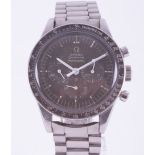 Omega Speedmaster Professional, manual wind chronograph, the black dial with three subsidiary dials,