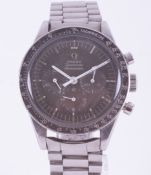 Omega Speedmaster Professional, manual wind chronograph, the black dial with three subsidiary dials,