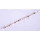 An 18ct fancy yellow gold diamond set line bracelet, total diamond weight 2.00ct.