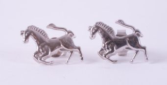 A pair of 9ct white gold 'Ferrari' style prancing horse stud earrings, stamped A & A 375, with