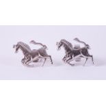 A pair of 9ct white gold 'Ferrari' style prancing horse stud earrings, stamped A & A 375, with