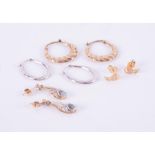 Four pairs of earrings to include a pair of 9ct white gold hoops, a pair of 9ct yellow gold hoops, a