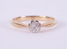 A yellow gold & platinum ring (no hallmarks but assessed to be 18ct), set with an old round cut