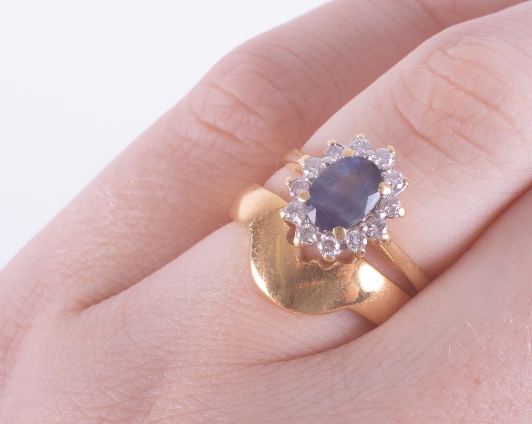 A set comprising of an 18ct yellow & white gold cluster design ring set with a central blue - Image 2 of 2