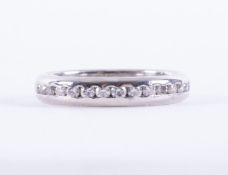 A platinum full eternity ring set with round brilliant cut diamonds, total diamond weight approx.