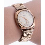 Accurist, a gents 9ct yellow gold, mechanical hand wind movement, arabic dial, with