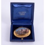 A 19th century ornate pinchbeck hand painted scenic brooch of Venice, view of the Arsenal