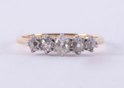 An 18ct yellow gold & platinum five stone old cut diamond ring, total diamond weight approx. just