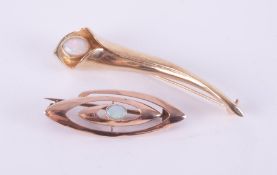 Two brooches to include a 9ct oval design brooch set with a cabochon cut opal, length approx. 3.5cm,